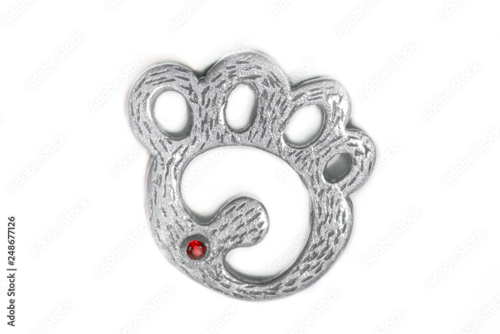 Obraz premium Unique bear foot pendant also used by the gay LGBT Bear community as their symbol in shades of brown