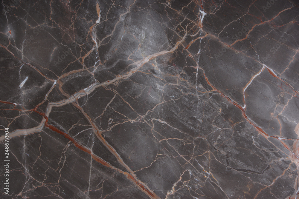 Brown marble with pink and red veins, called Caravaggio Brown marble with pink and red veins, called Caravaggio
