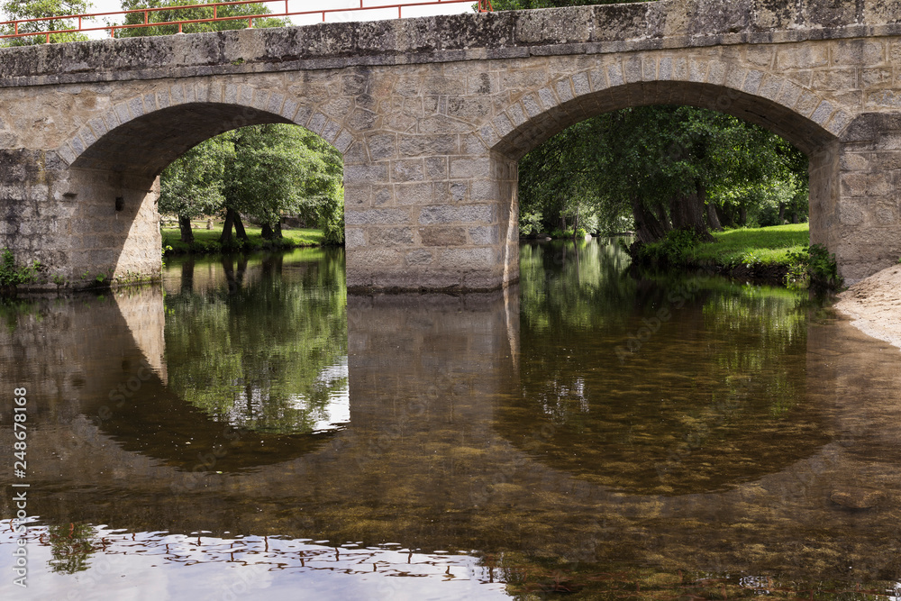 Fototapeta premium Old stone bridge for a highway