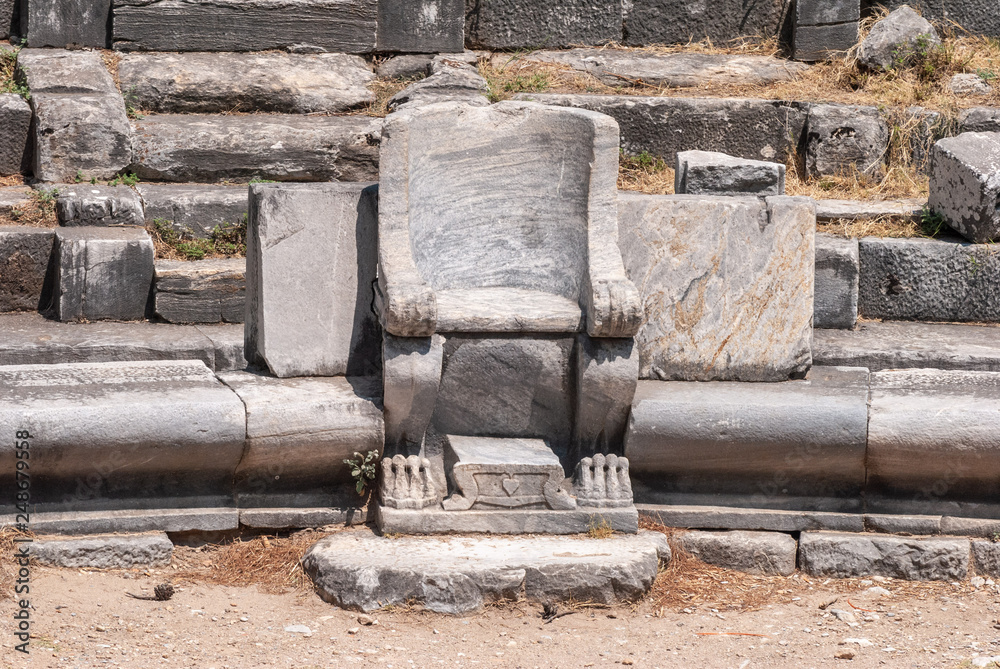 Prohedria marble seat at ruined theatre of Priene ancient site in Turkey. Prohedria marble seat at ruined theatre of Priene ancient site in Turkey.