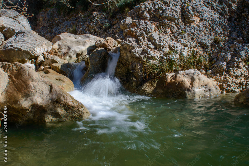 Water flowing into a pool from front - La Hoz
