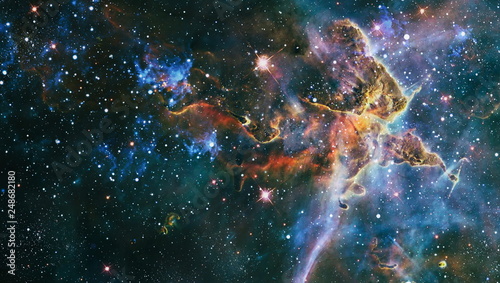 Nebula night starry sky in rainbow colors. Multicolor outer space. deep space many light years far from planet Earth. Elements of this image furnished by NASA. - Image