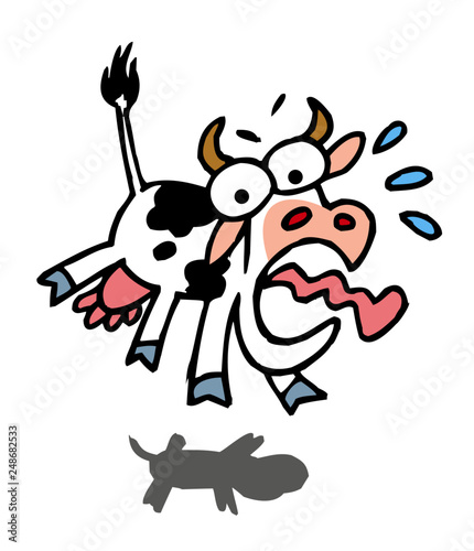 Frightened cow jumps up with wide eyes, cartoon joke