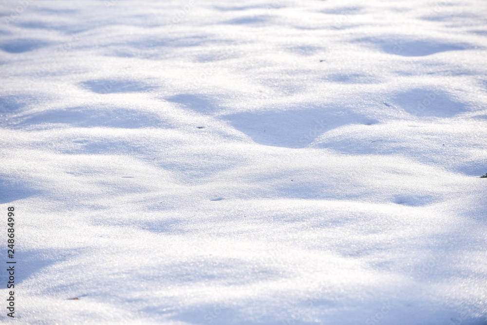 Snow background. Small snow hills, winter landscape, snow, white snow and shadow. Snow background. Small snow hills, winter landscape, snow, white snow and shadow.