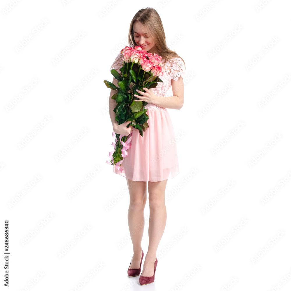Woman in dress with flowers roses in hand on white background isolation Woman in dress with flowers roses in hand on white background isolation