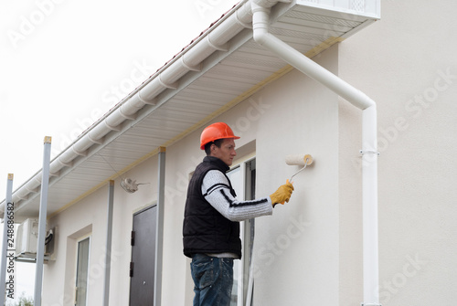 master paints the wall