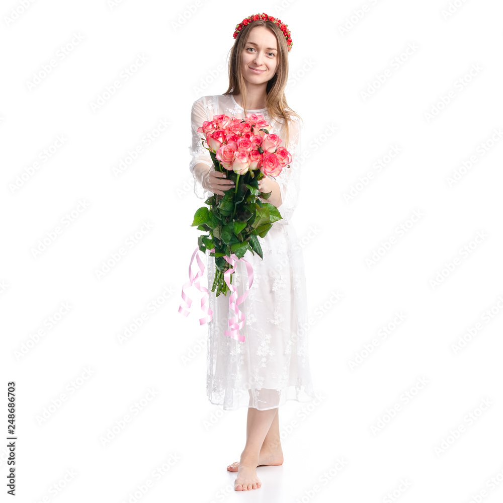 Woman in dress with flowers roses in hand on white background isolation Woman in dress with flowers roses in hand on white background isolation