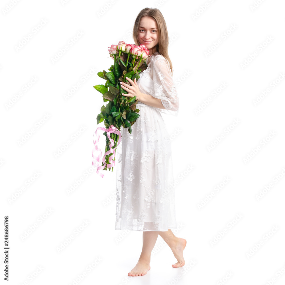 Woman in dress with flowers roses in hand on white background isolation Woman in dress with flowers roses in hand on white background isolation