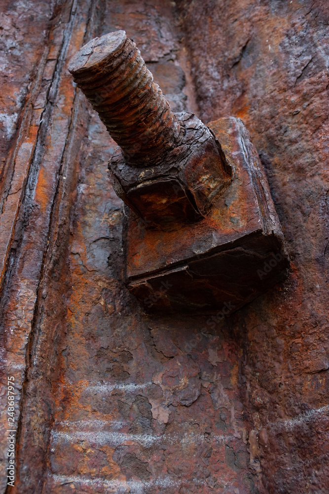 Rusty Nut and Bolt in a rusty wall Rusty Nut and Bolt in a rusty wall