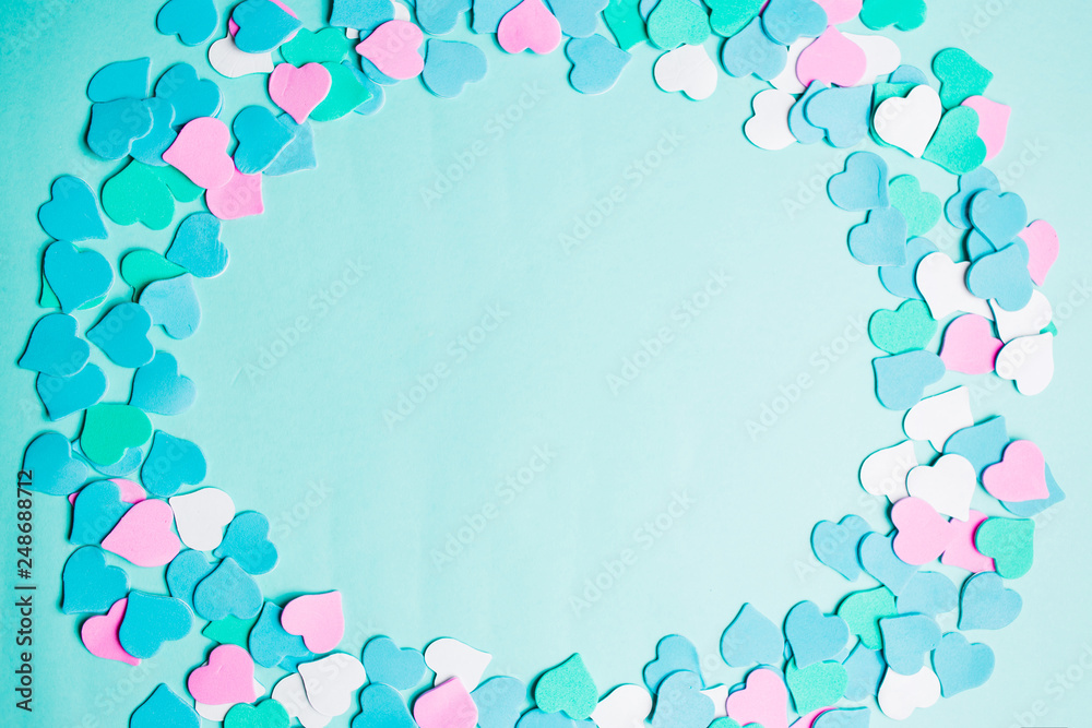 Beautiful blue background with small hearts, text frame, copy space.
