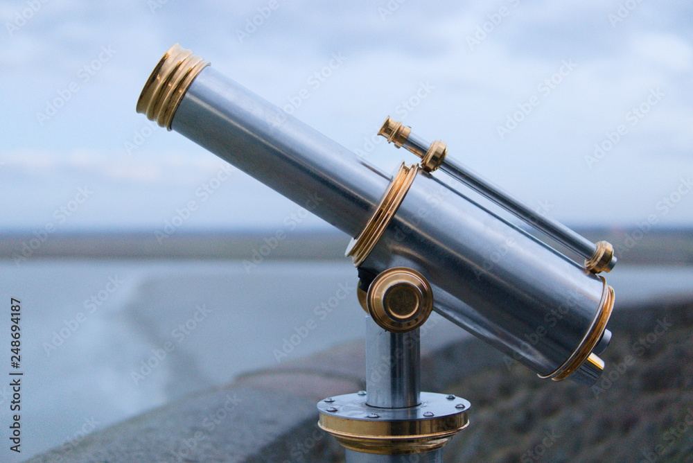 Telescope tower viewer chrome gold mont saint michel france tourism ocean