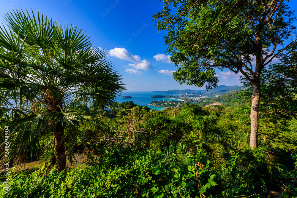 Karon View Point - View of Karon Beach, Kata Beach and Kata Noi in Phuket, Thailand. Landscape scenery of tropical and paradise island. Beautiful turquoise sea and blue sky on summer day. Karon View Point - View of Karon Beach, Kata Beach and Kata Noi in Phuket, Thailand. Landscape scenery of tropical and paradise island. Beautiful turquoise sea and blue sky on summer day.