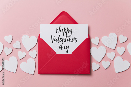 Happy Valentine's day white card with red paper envelope