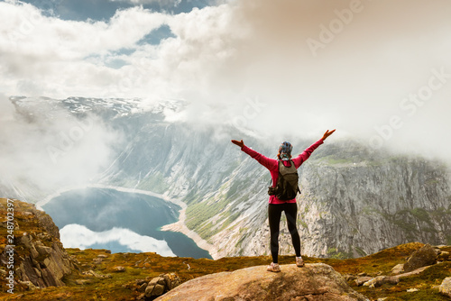 Hiker on the mountain top. Sport and active life concept. Trolltunga Norway