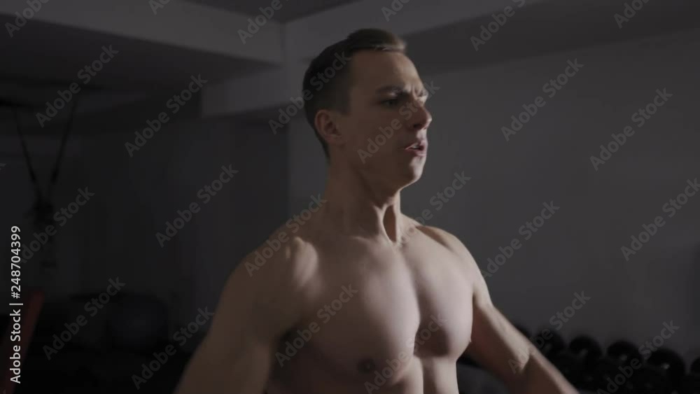 Close up of man exercising with dumbbell Close up of man exercising with dumbbell