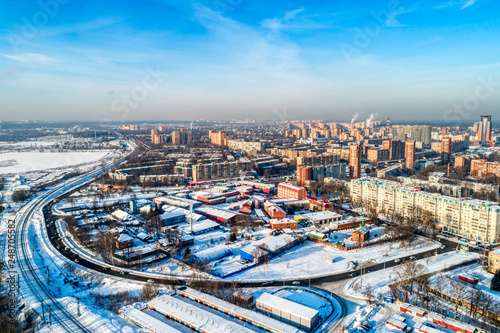 Aerial view of the modern city district. Winter  sunny day