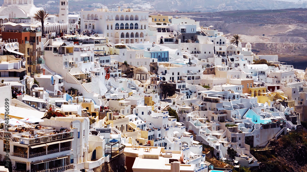 View of Oia or Ia village in the South Aegean on the islands of Thira Santorini and Therasia, in the Cyclades, Greece.