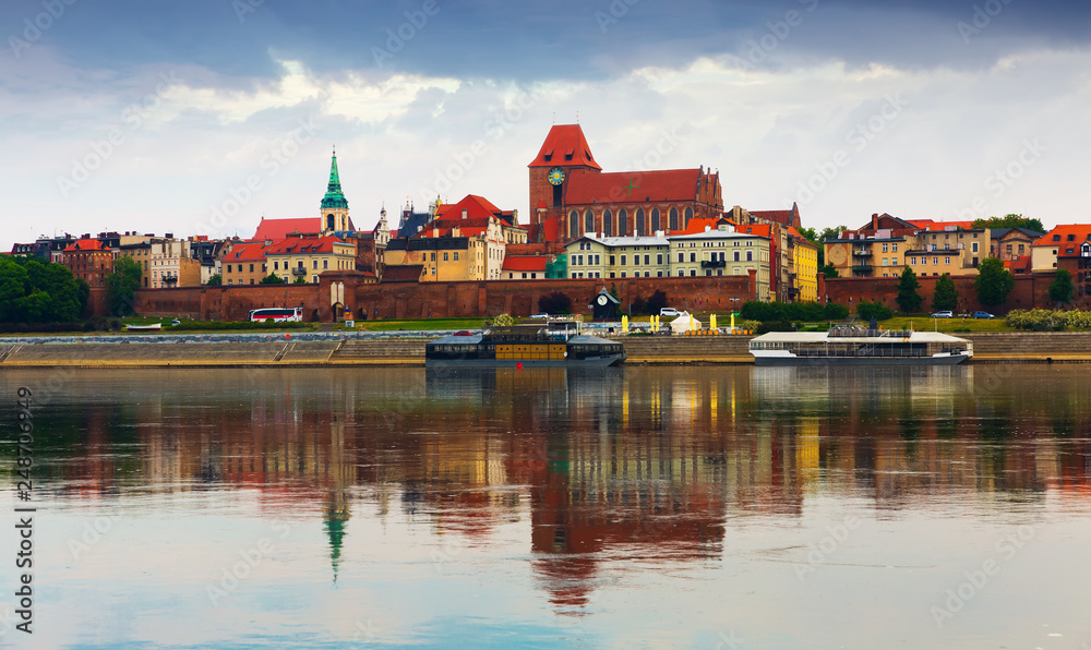 Fototapeta premium Torun with Cathedral Basilica across Vistula