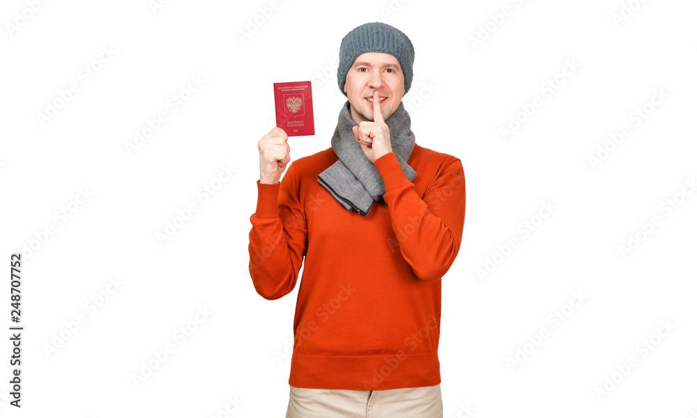 The Caucasian man with the international passport of the Russian Federation in warm clothes