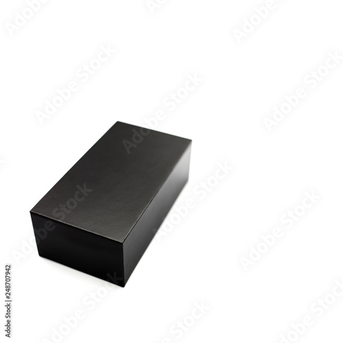 Closed black box of textured cardboard on white background. Isolated..