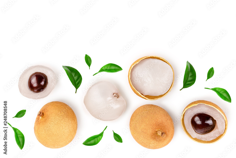 Fresh longan fruit with leaves isolated on white background. Top view. Flat lay Fresh longan fruit with leaves isolated on white background. Top view. Flat lay