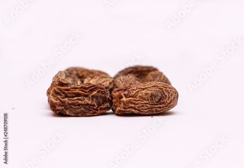 Shot of dry dates with white background in a studio