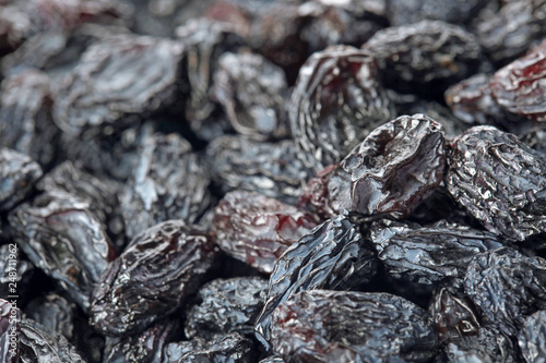 Tasty raisins as background, closeup. Healthy dried fruit © New Africa
