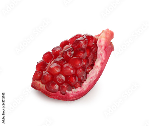 Ripe pomegranate on white background. Delicious fruit