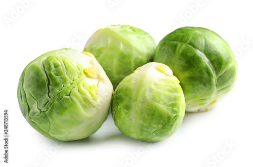 Fresh tasty Brussels sprouts on white background