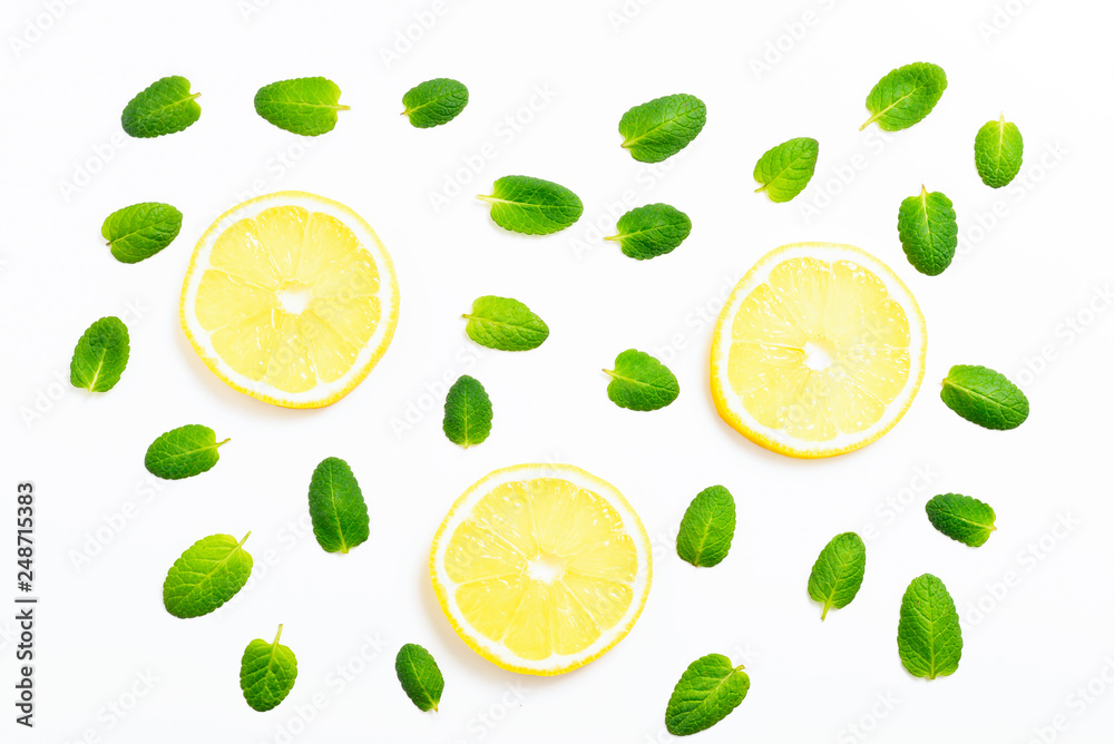 Mint leaves am lemon slices on white background