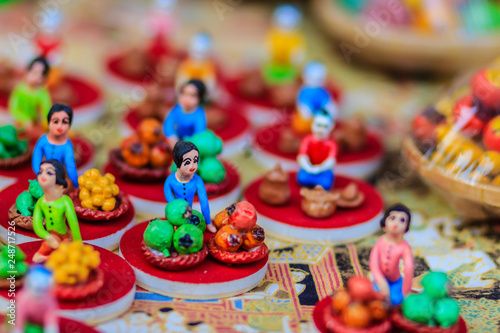 Cute Clay Dolls of Thai Culture, Selective Focus © kampwit