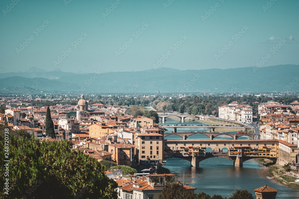view of Florence in Italy with Old Palace and Dome of Cathedral from Michelangelo Square