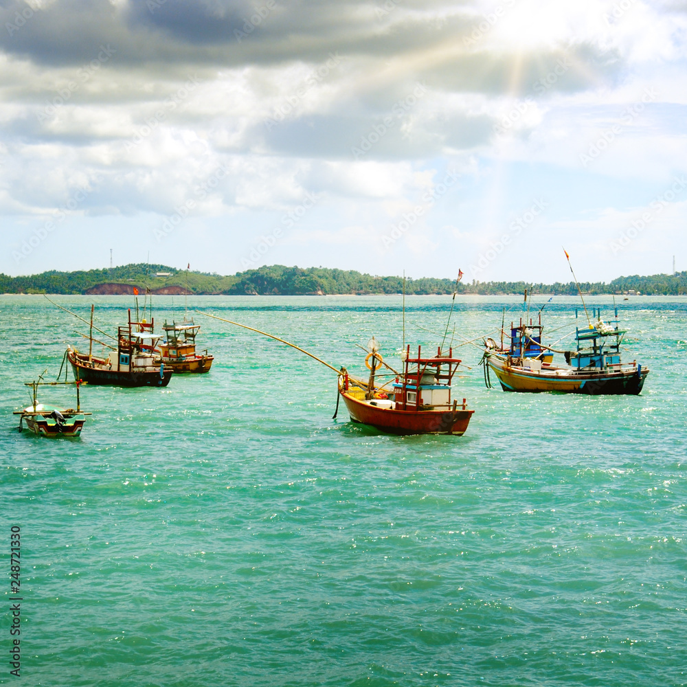 Beautiful seascape with fishing boats on the water. Sri Lanka.