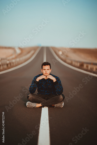 Photography of young man on the road