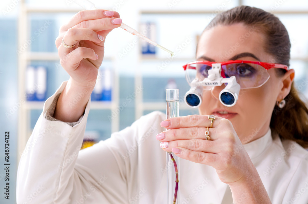 Female biotechnology scientist chemist working in the lab Female biotechnology scientist chemist working in the lab