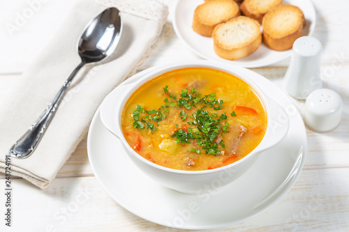 Red lentil soup with vegetables. The view from the top. Copy-space.