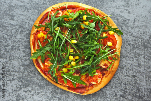 Vegan pizza with fresh arugula. Healthy food.