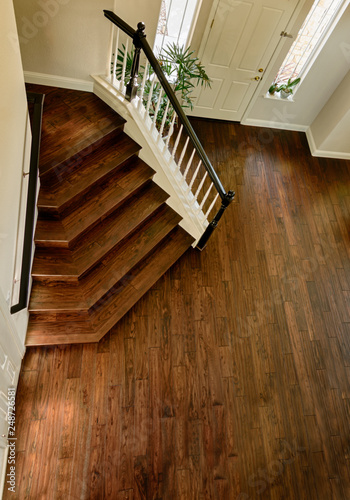 wooden staircase and hardwood floor