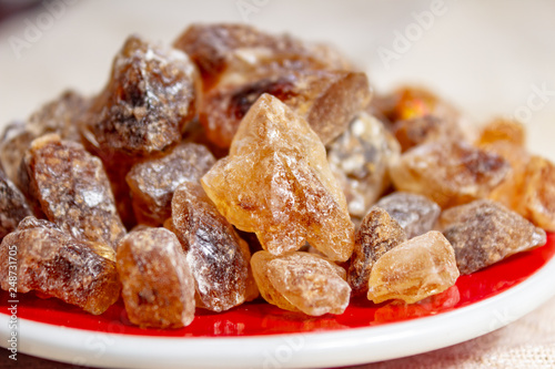 Crystals of candy sugar, traditional brown rock sugar originally from Isfachan, Iran photo