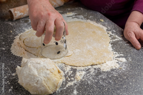 Preparing the pastry to make small cakes