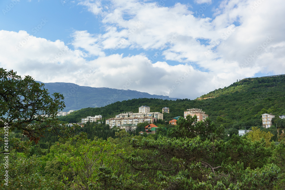 View of residential multi-storey old houses on a mountain slope in the village of Gaspra in the Crimea View of residential multi-storey old houses on a mountain slope in the village of Gaspra in the Crimea