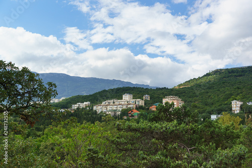 View of residential multi-storey old houses on a mountain slope in the village of Gaspra in the Crimea