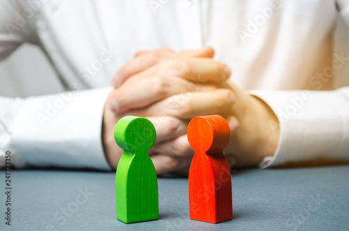 The arbitrator examines the conflict situation between people. Search for solutions and compromises. Conflict of interest. Smoothing disputes. Court and law. Justice. Verdict. Legal support