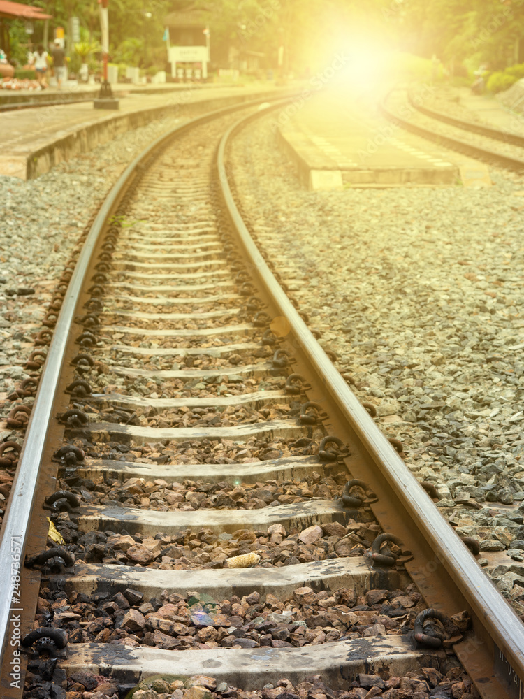 The railway track at station area with sunlight. The railway track at station area with sunlight.