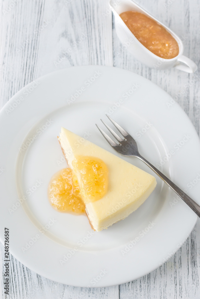 Traditional cheesecake on the wooden table Traditional cheesecake on the wooden table