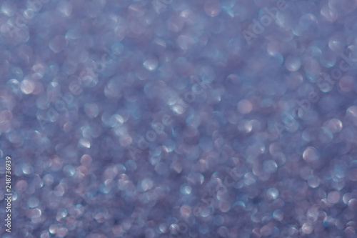 Abstrast blurred glittery shiny background, lilac, defocused