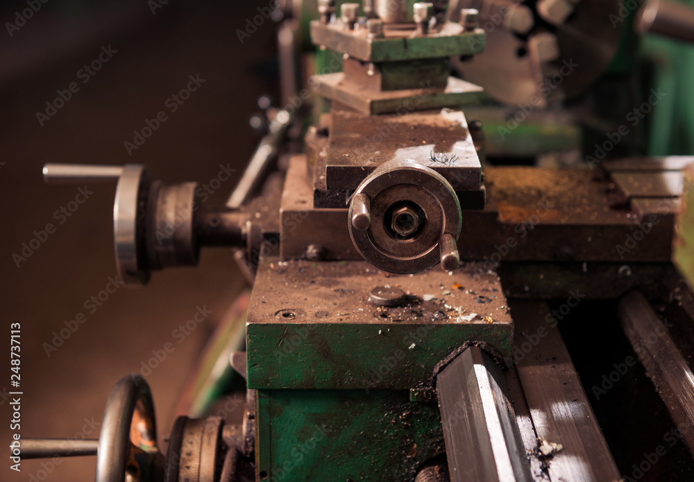 control wheels in part of vintage metal processing machine