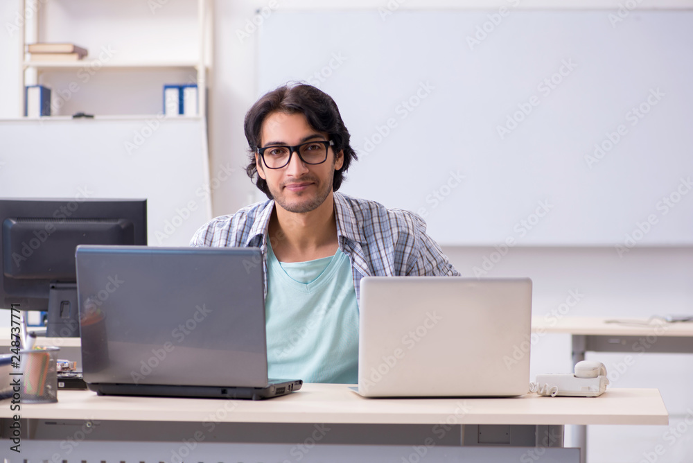 It specialist working in the office It specialist working in the office