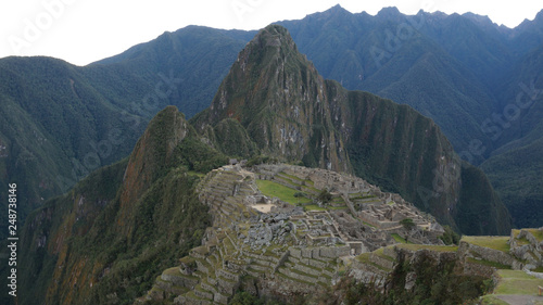 Ancient Inca Town of Machu Picchu in the Andes mountains seen from the Salkantay Trek near Cusco, Peru.