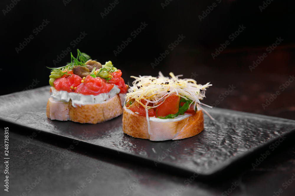 sandwiches on a black background. sandwiches on a black background.